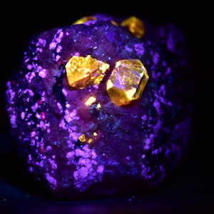 289 Carat Natural Fluorescent Red Zircon Crystal With Calcite & Mica On Matrix