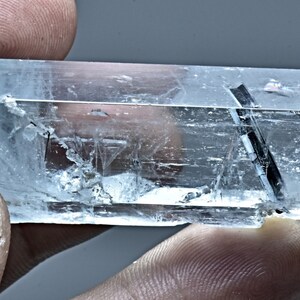 155 Carat Natural Terminated Transparent Aquamarine Crystal with Black Tourmaline Inclusion