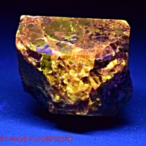 38 Gram Fluorescent Terminated Red Zircone Crystal