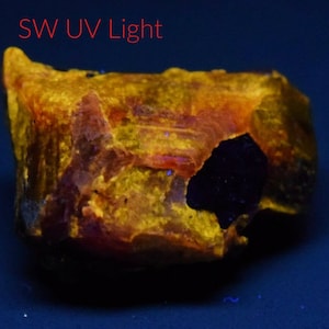 36 Carat Terminated Fluorescent Red Zircon Crystal From Pakistan