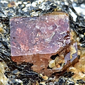 137 Carat Natural Fluorescent Terminated Red Zircon Crystal On Matrix