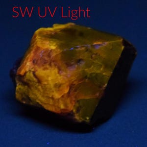 39 Carat Terminated Fluorescent Red Zircon Crystal From Pakistan