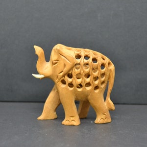elefante de madera tallada,elefante tallado a mano,elefante hecho a mano,elefante de decoracion,elefante tallado,figura de elefante