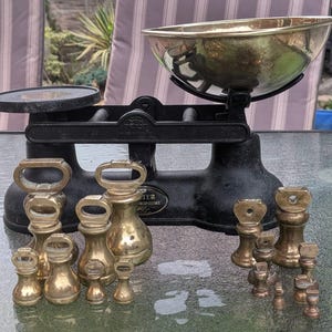The Salter Staffordshire Black Cast Iron Weighing Scales plus Brass Bell Weights