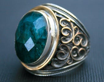 Faceted Emerald Ring in Sterling Silver with Ornate Filigree Design