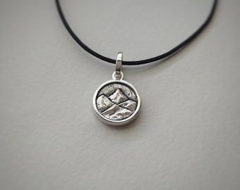 Double-sided pendant Mountains and Wave. Silver 925