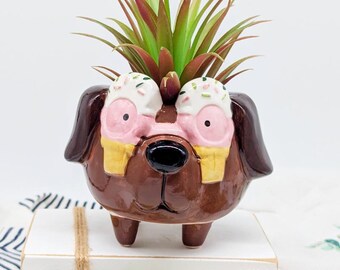 Maceta para perro marrón con ojos espolvoreados