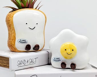 Maceta de cerámica con diseño de tostada de huevo