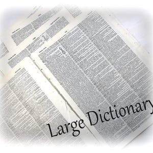 May include: A stack of open dictionary pages with small text, featuring the words "Large Dictionary" in a bold, black font. The pages are off-white with a slight yellow hue, suggesting age.