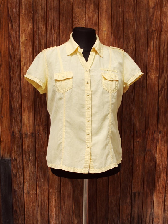yellow button up blouse