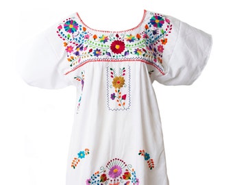 white embroidered mexican dress