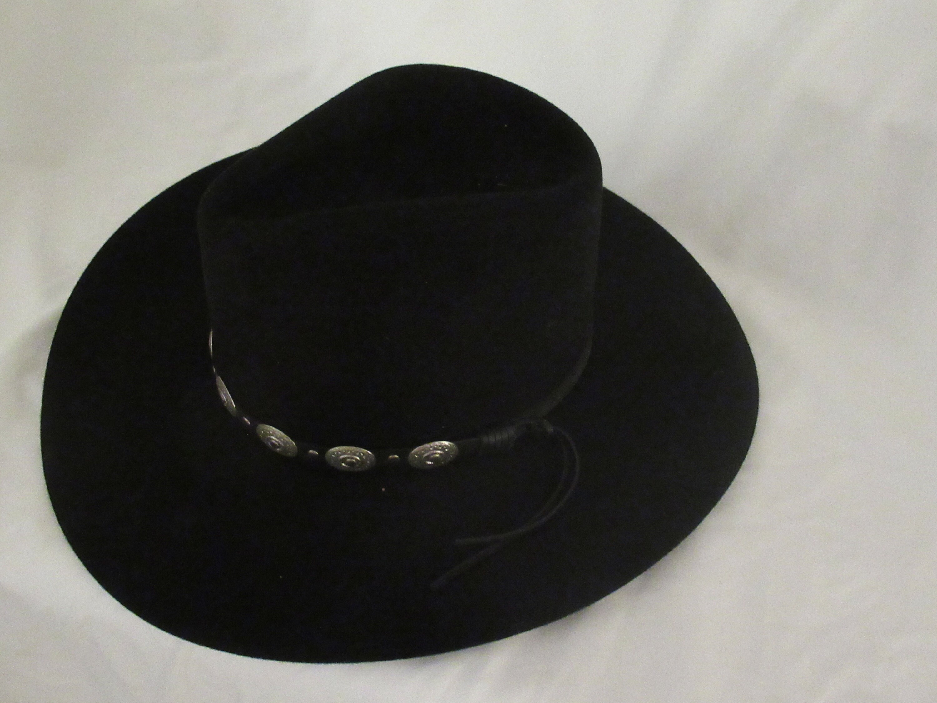 black felt cowboy hat with red trim