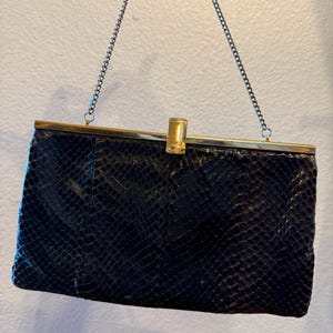 May include: A set of three ceramic mugs with a speckled, matte finish in cream, light grey, and dark grey. Each mug has a simple, minimalist design, ideal for coffee or tea.