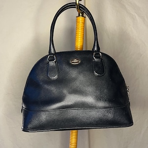 Sac cartable noir Coach vintage dôme - Design classique et intemporel
