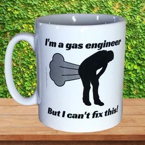 May include: White ceramic mug with a black silhouette of a person letting out a cloud of gas. The text on the mug reads "I'm a gas engineer but I can't fix this!"
