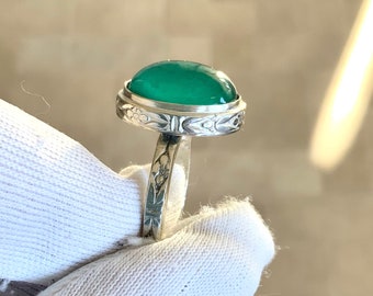 Silver ring with green chrysoberyl Cat’s eye