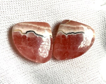 Precious rhodochrosite matched pair cabochons