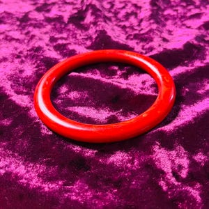 Vintage Armreif in orange marmoriert