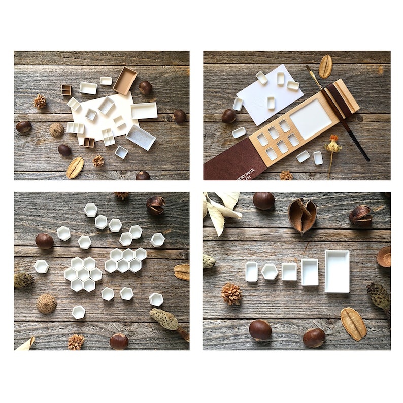 Może przedstawiać: Zestaw białych palet do akwareli w r&oacute;żnych kształtach i rozmiarach, w tym sześciokątne i prostokątne palety. Palety są ułożone na drewnianej powierzchni z naturalnymi elementami, takimi jak orzechy i suszone kwiaty.