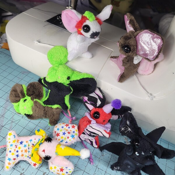 Custom plush mouse adventure buddy ready to be worn as a hair clip or a clothing pin