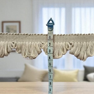 jasna lamówka z frędzlami w kształcie wachlarza, lamówka z pętelkami, lamówki z pętelkami w kształcie wachlarza, lamówki bawełniane, lamówka z frędzlami w kształcie wachlarza, lamówki cięte na wymiar, lamówka z frędzlami w kształcie wachlarza