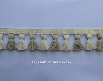 Light stone and ivory tassel trim, tasssl fringe, tassel fringe trim, fringe trim, fringe tassel, trim, home decor, tasssl and trims