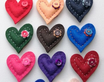 A Handmade Felt Heart Brooch with button embellishment, ideal for gift or favour