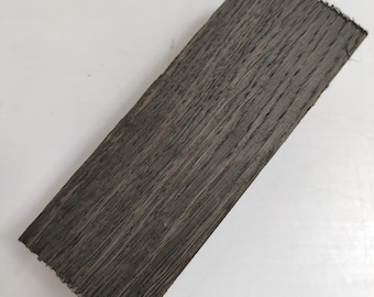 Dark brown bog oak (morta) blank for knife handles of size 23*40*130 mm