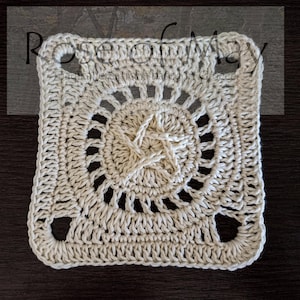 May include: A square crochet granny square with a star design in the centre. The square is made with cream coloured yarn.