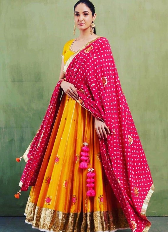Red yellow lehenga best sale choli