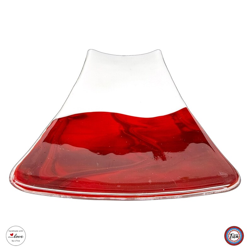A curved rectangular glass tray on a white background features a solid white top section and a large, rich red marbled lower section.