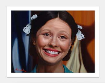 May include: A portrait of a smiling person with dark hair styled in pigtails, adorned with white lace hair accessories. The person is wearing a teal top, and the background features a mix of blue and brown tones.