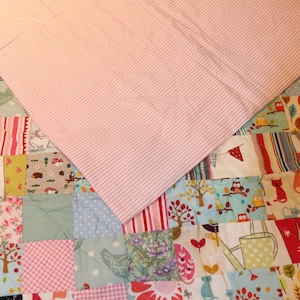 Pink patchwork quilt, handmade