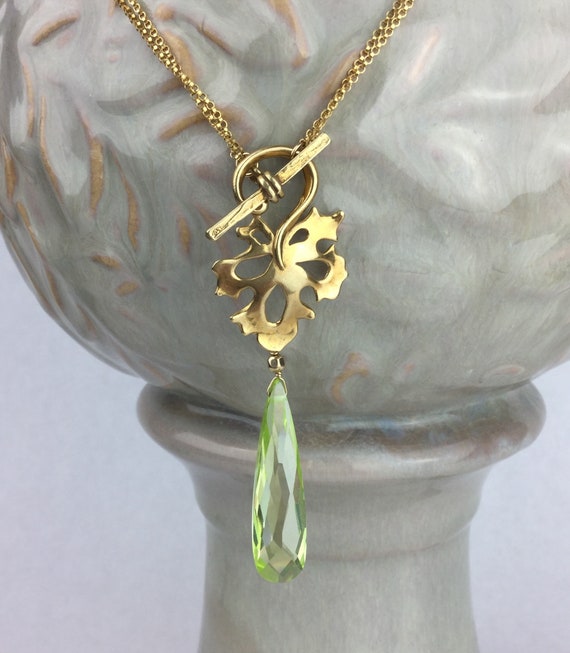 Gold Grape Leaf And Crystal Drop Toggle Necklace