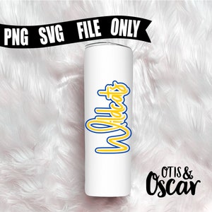 May include: White tumbler with a yellow and blue Wildcats design. The tumbler is on a white fluffy surface. The text Otis & Oscar is in black below the tumbler.