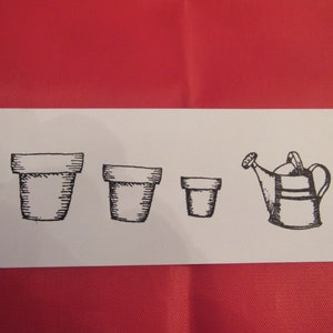 May include: A black and white illustration of three different sized flower pots and a watering can.