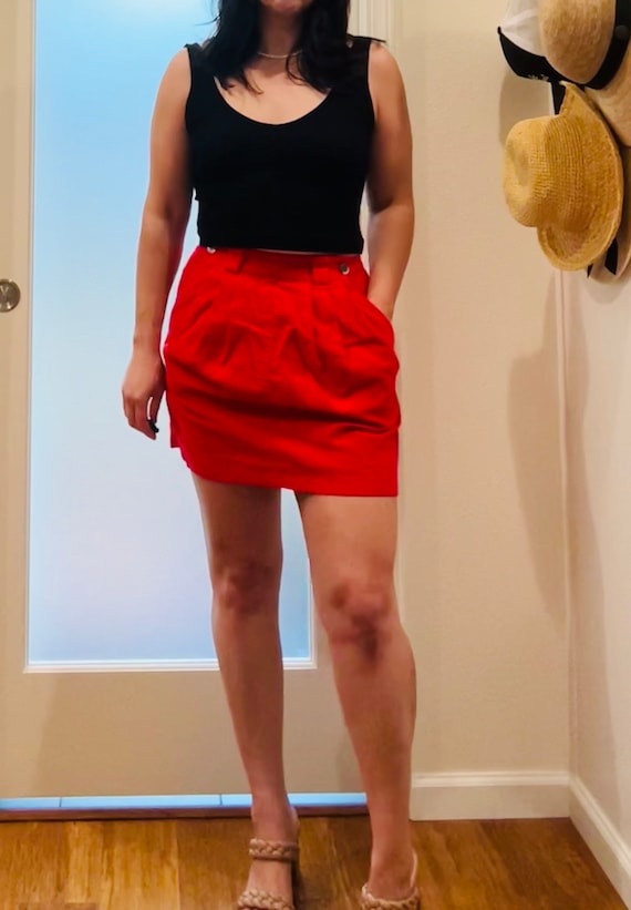 Corduroy pleated red mini skirt with pockets