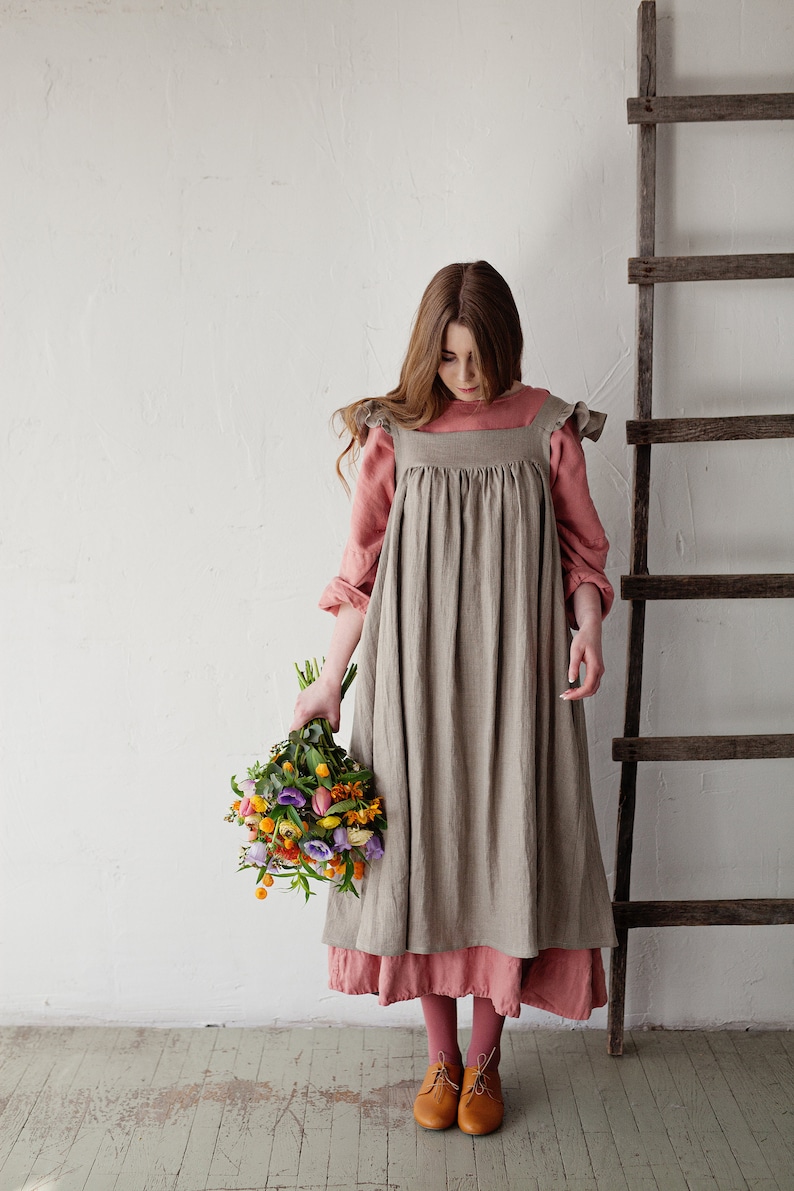 Cottagecore Clothing, Soft Aesthetic Linen Dress with Flutter Sleeve Oversized Apron Natural Linen Apron Linen Dress with Wings Ruffle Sleeve Apron Victorian Style Pinafore $103.56 AT vintagedancer.com