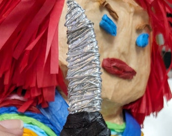 El Chucky papier-mâché sculpture