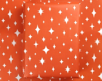 Red Christmas Star Print Wrapping Paper Sheet - Festive Holiday Gift Wrap - Illustrated Paper UK - 700 x 500mm