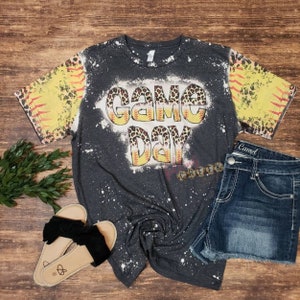Game Day,  softball and leopard distressed letters. Softball and leopard distressed sleeves, front and back bleached tshirt.