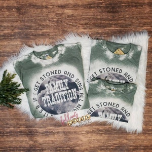 Family Tradition, country song shirt with vintage style photo in background.  Circle design shown on military green bleached unisex fit tshirt.