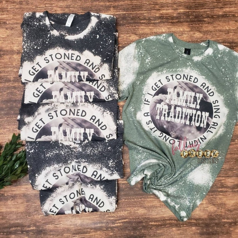 Family Tradition, country song shirt with vintage style photo in background.  Circle design shown on military green bleached and dark grey bleached unisex fit tshirt.