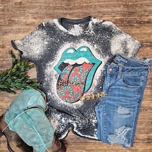 Turquoise stone, southwestern rock and roll tongue bleached graphic t-shirt. Trendy Western cowgirl rodeo Dark grey distressed shirt.