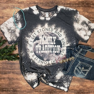 Family Tradition, country song shirt with vintage style photo in background.  Circle design shown on dark grey bleached unisex fit tshirt.
