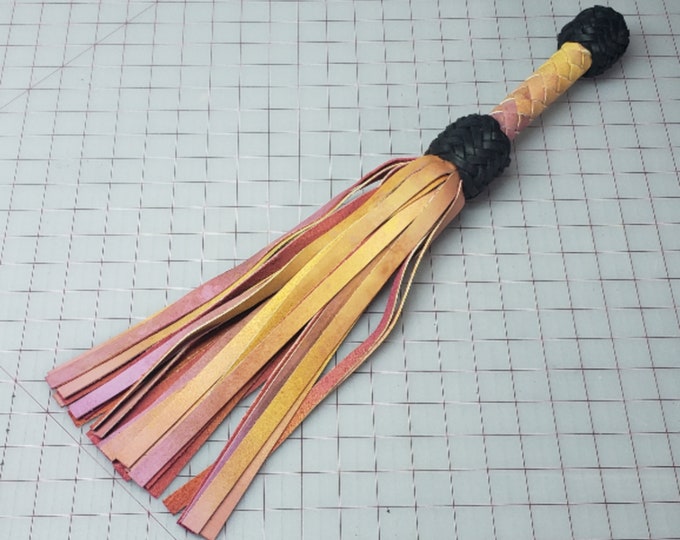 Hand dyed "Rocket Pop" leather flogger