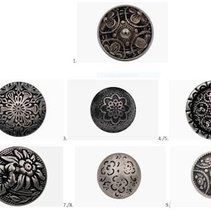 May include: Nine antique silver buttons with embossed designs. The buttons feature floral, geometric, and ornate patterns. Each button is round and has a unique texture and style. The collection showcases detailed craftsmanship.