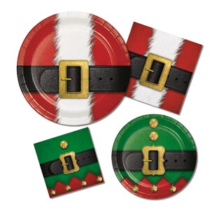 May include: A festive assortment of Christmas-themed paper plates and napkins. The plates feature a Santa belt design with red and white stripes, a black belt, and a gold buckle. The napkins have an elf belt design with green and red accents.