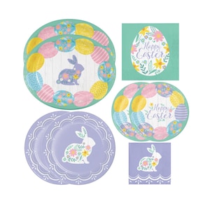 May include: A set of pastel-colored Easter party plates and napkins featuring a floral bunny design. The plates have a green border and the napkins have a scalloped edge. The plates and napkins say "Happy Easter" in a floral wreath.