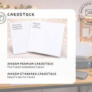 May include: Two white cardstock samples are displayed. One is labeled Textured hammered cardstock and the other is labeled Smooth white cardstock. Text below reads 300GSM PREMIUM CARDSTOCK TEXTURED HAMMERED FINISH and 300GSM STANDARD CARDSTOCK SMOOTH WHITE FINISH.